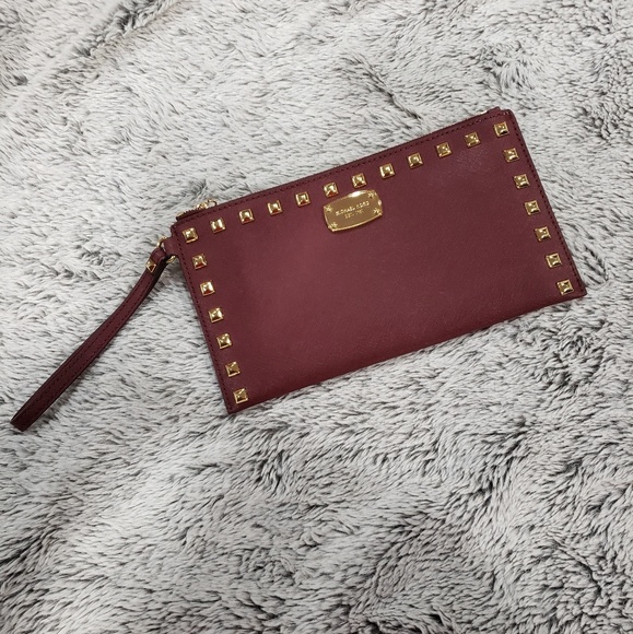 Michael Kors Handbags - MICHAEL KORS Studded Purple Wristlet